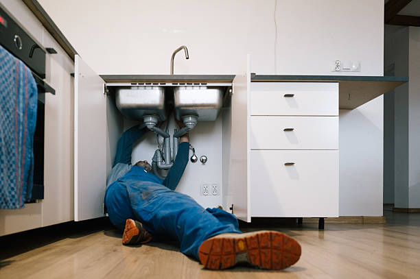 Professional Drain Cleaning technician working in Millis, MA